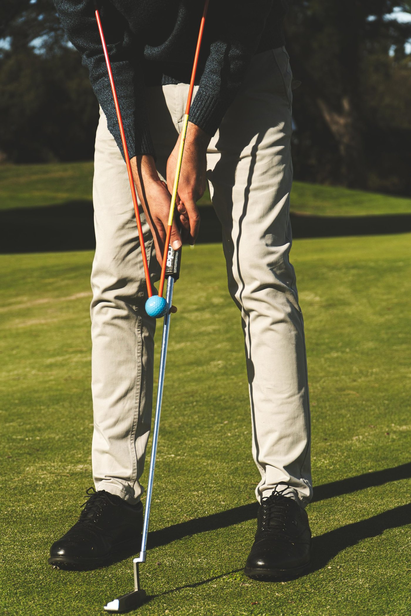 Entrenador de Swing Pro montado sobre un palo de golf